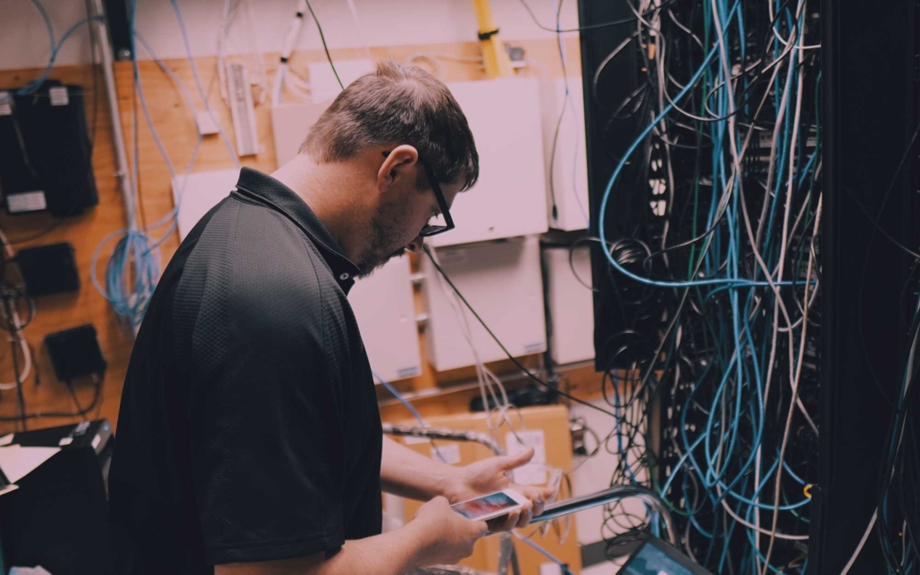 en computers worker installing cabling