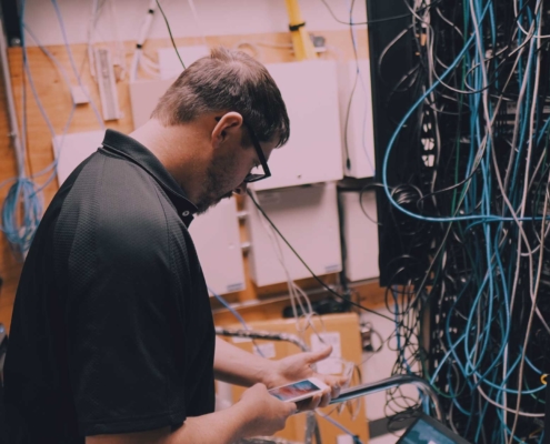 en computers worker installing cabling