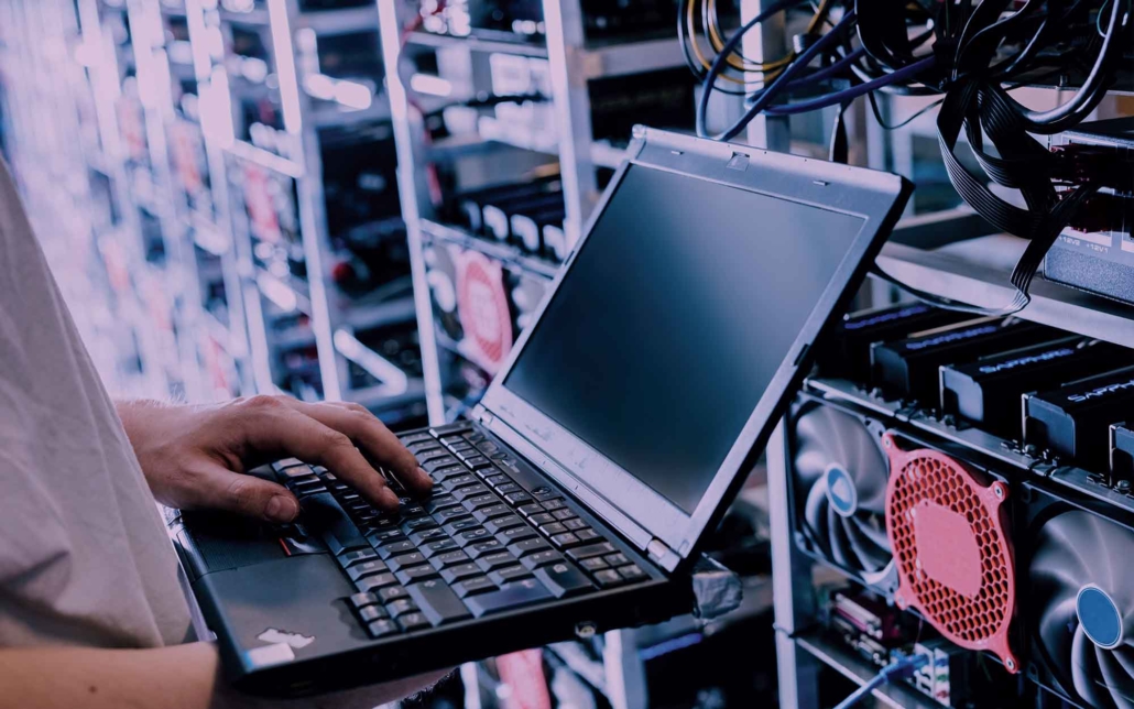 guy-on-computer-testing-a-system