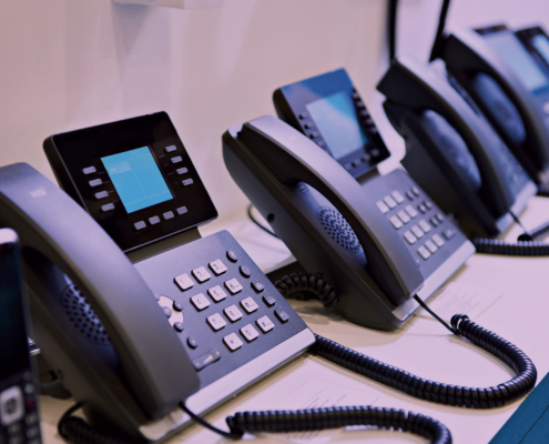 set of voip phones on a table