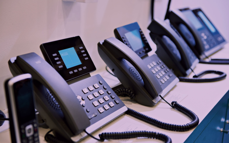 set of voip phones on a table