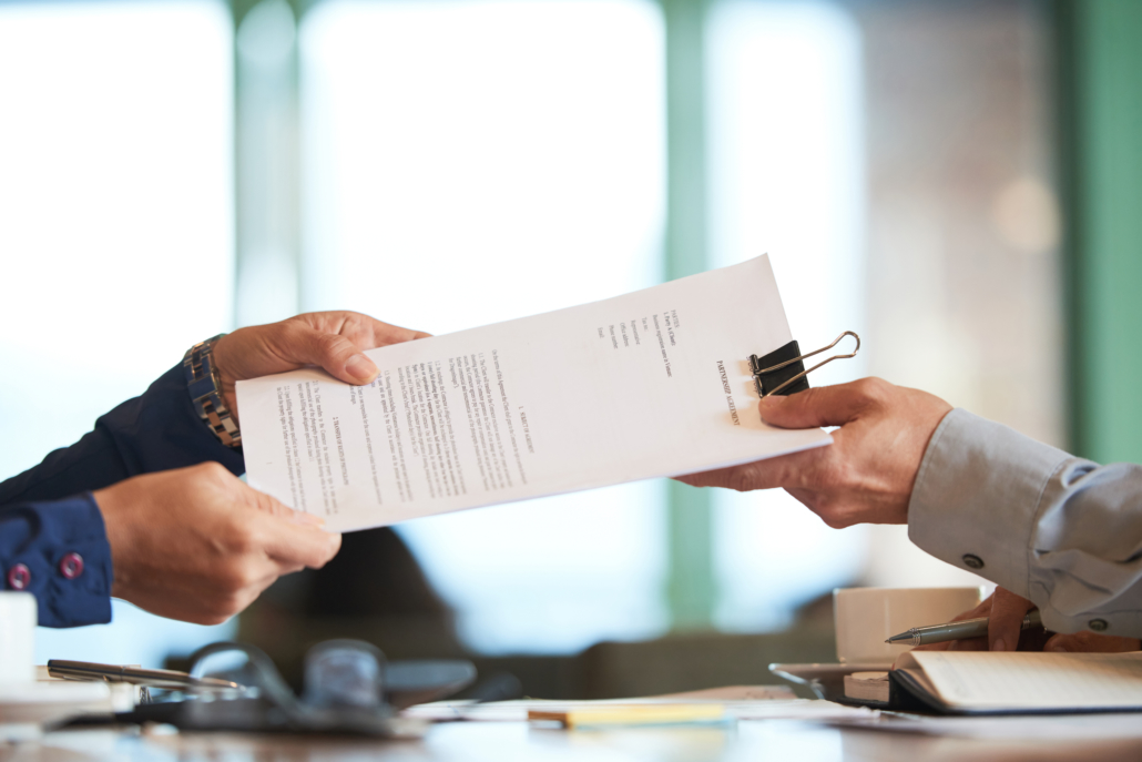 Contract or proposal handed off between two people