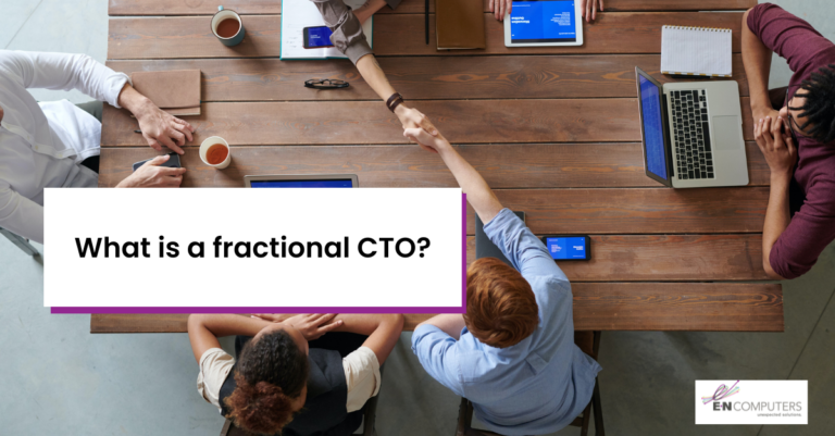 Title card: "What is a fractional CTO?" Background is six people around table with two shaking hands across the table.