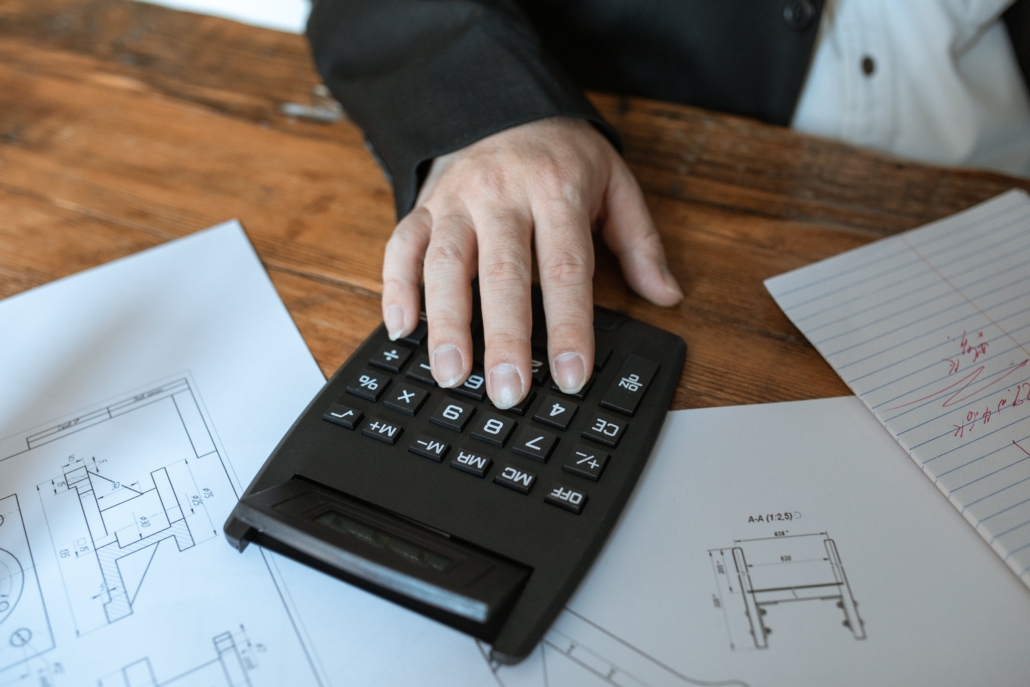 Calculator, illustrating cost of CMMC consulting