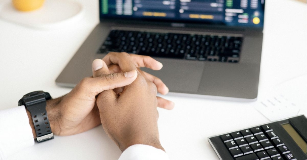 Laptop and calculator representing pricing for network support services