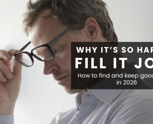 "Why it's so hard to fill IT jobs - how to find and keep good IT staff in 2026". Background is a man in a dress shirt holding his glasses and contemplating.