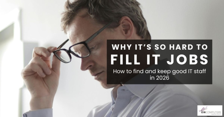 "Why it's so hard to fill IT jobs - how to find and keep good IT staff in 2026". Background is a man in a dress shirt holding his glasses and contemplating.