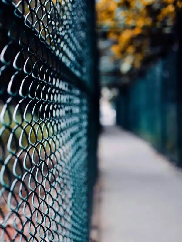 Security chainlink fence to illustrate the need for security cameras