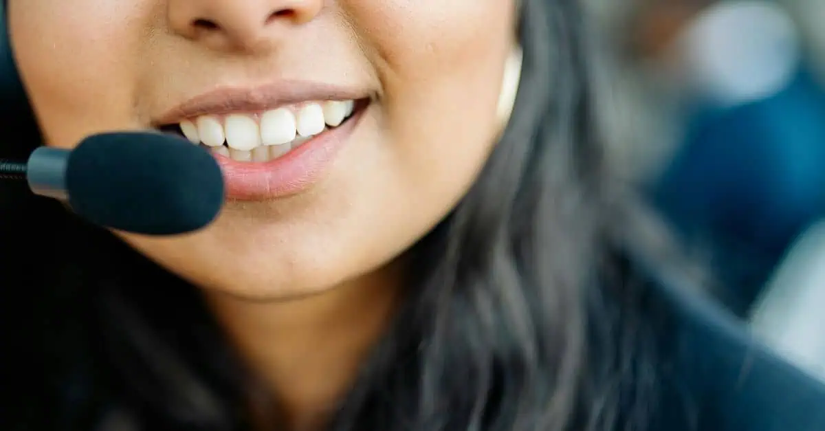 Friendly outsourced IT help desk technician with a smile