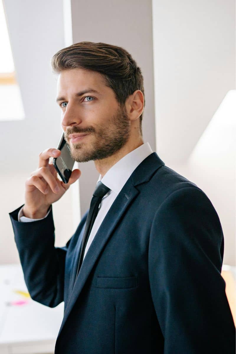 Business VoIP extensions everywhere Businessman on cell phone